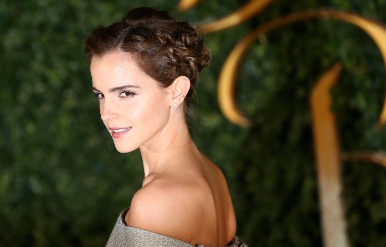 Actor Emma Watson poses for photographers at a media event for the film "Beauty and the Beast" in London