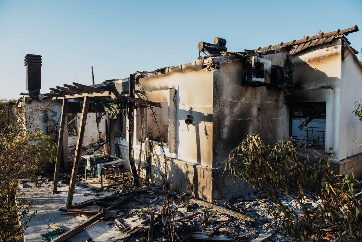 A burned house stands among debris following a wildfire in the Seferihisar district of Izmir, Turkey, on June 30, 2025