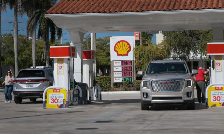 MIAMI, FLORIDA - APRIL 13: Fuel prices are displayed on a sign as customers fill their vehicles at a gas station on April 13, 2026 in Miami, Florida. As the United States military blockades the Strait of Hormuz fuel prices rose above $100 dollars a barrel. Joe Raedle/Getty Images/AFP (Photo by JOE RAEDLE / GETTY IMAGES NORTH AMERICA / Getty Images via AFP)