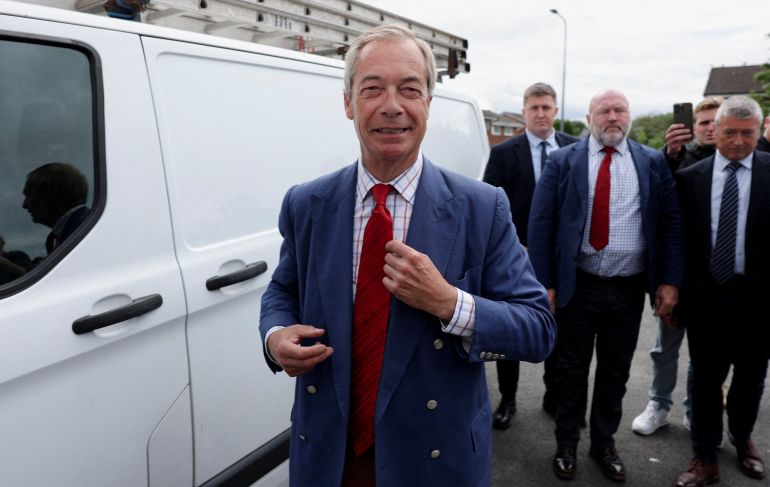 Reform UK leader Nigel Farage arrives at a polling station during the Makerfield by-election, triggered by the resignation of Labour MP John Simons, at St. Aidan's Parish Centre, Wigan, Britain, June 18, 2026. REUTERS/Temilade Adelaja REFILE - CORRECTING ACTION FROM "ARRIVES TO VOTE" TO "ARRIVES AT A POLLING STATION".